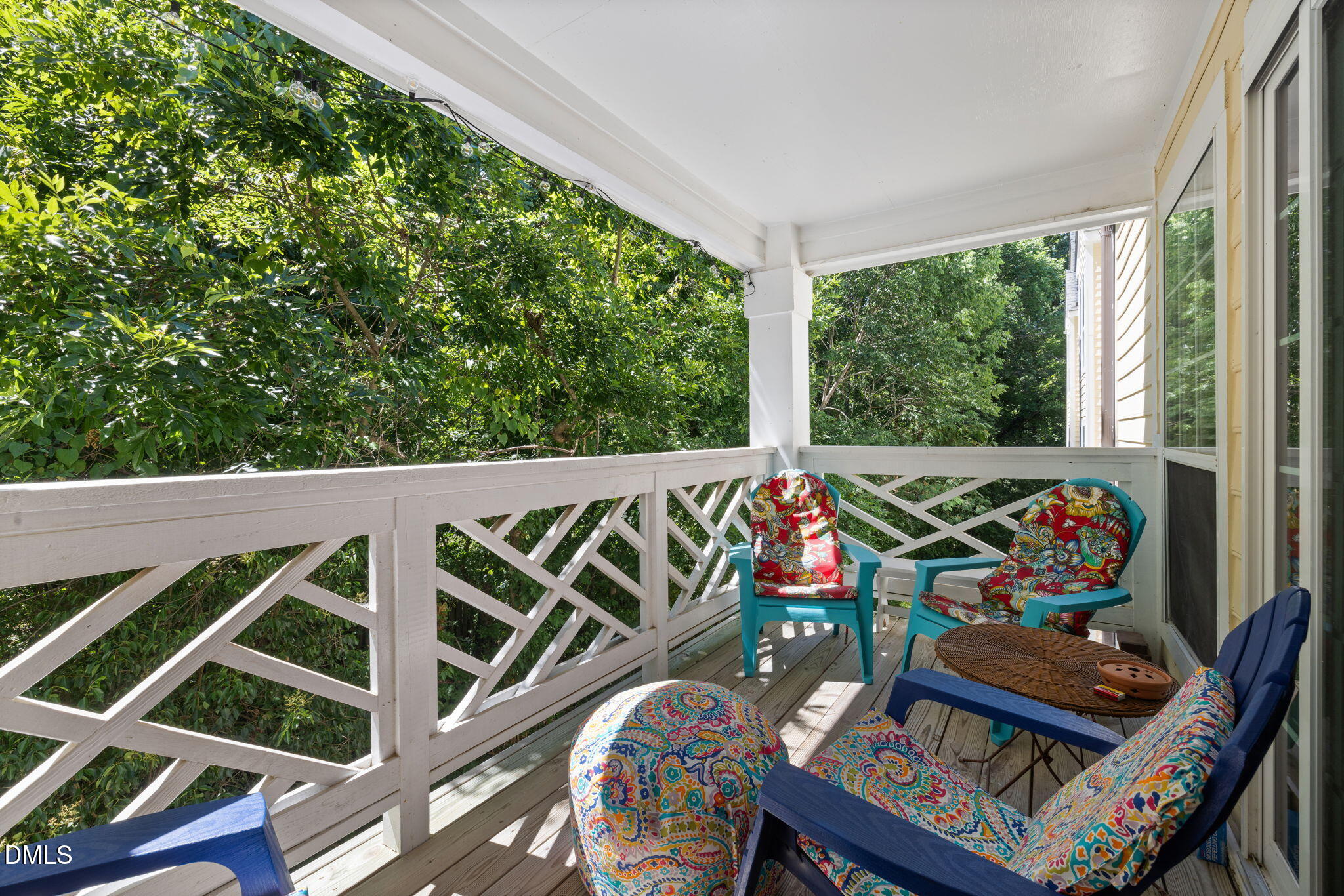 1003 Kingswood Drive, Unit N Chapel Hill, NC 27517 - Photo 20 of 23 a balcony with furniture and wooden floor