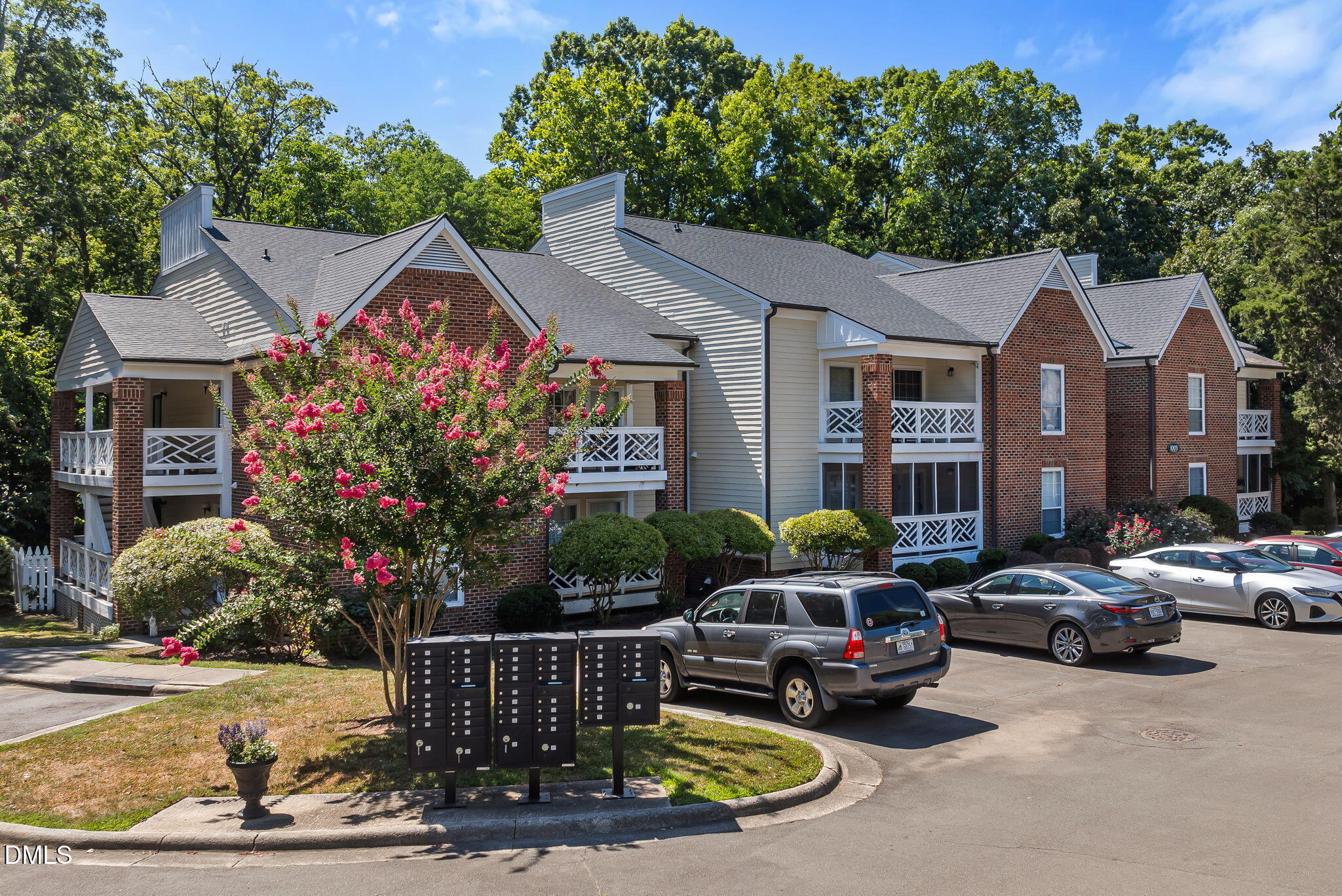 1003 Kingswood Drive, Unit N Chapel Hill, NC 27517 - Photo 22 of 23 a front view of a house with yard porch and furniture