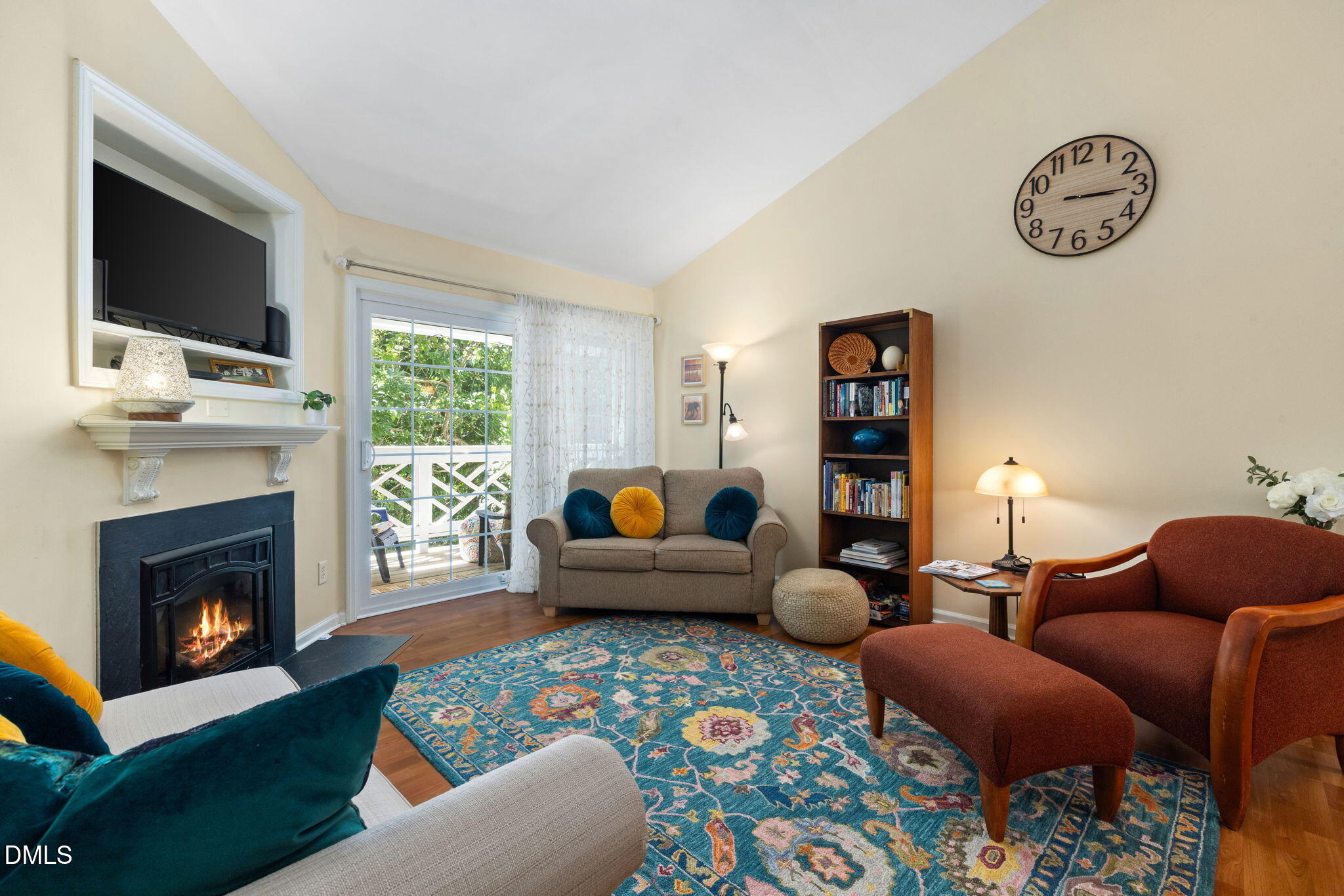 1003 Kingswood Drive, Unit N Chapel Hill, NC 27517 - Photo 4 of 23 a living room with furniture and a fireplace