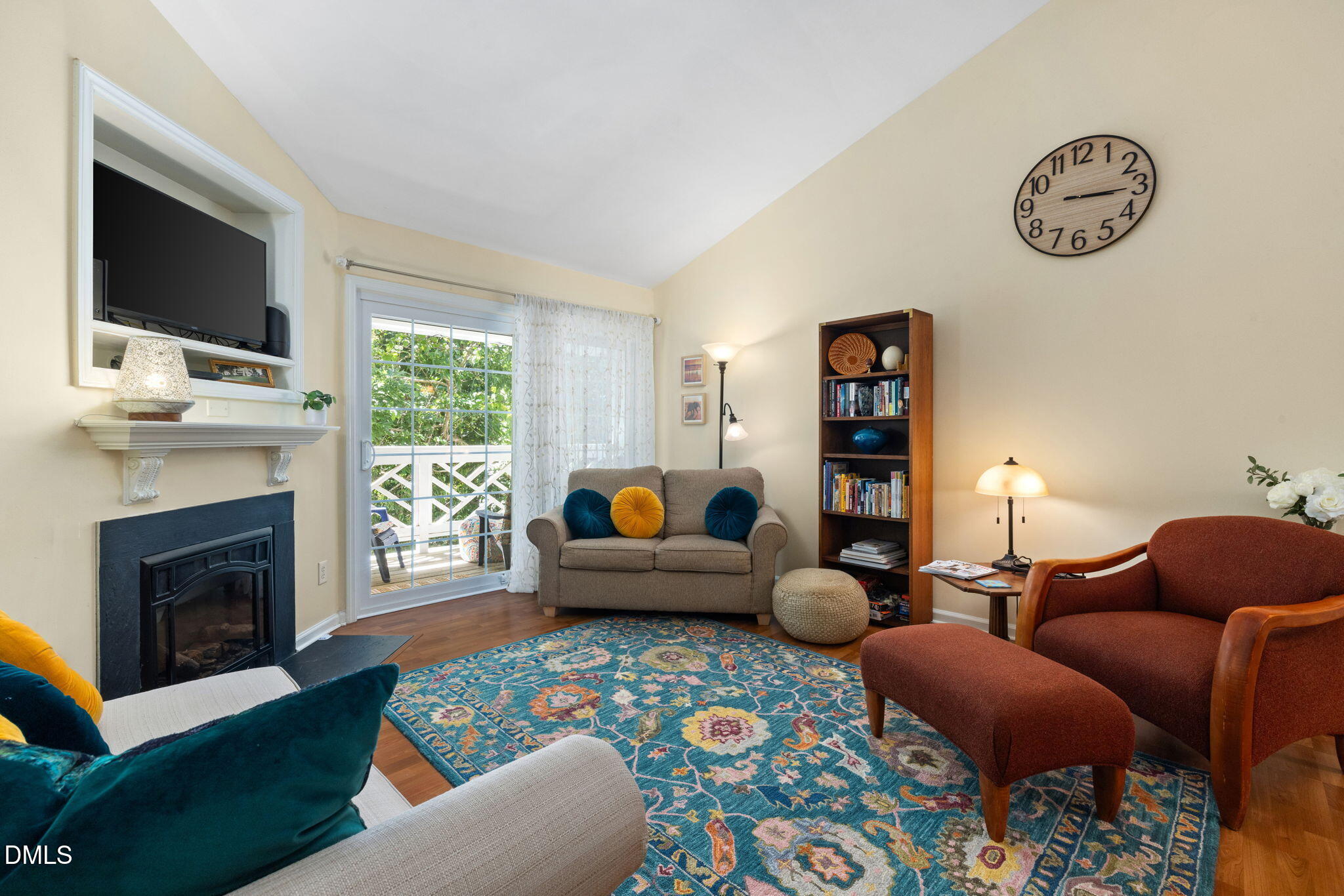 1003 Kingswood Drive, Unit N Chapel Hill, NC 27517 - Photo 5 of 23 a living room with furniture fireplace and window