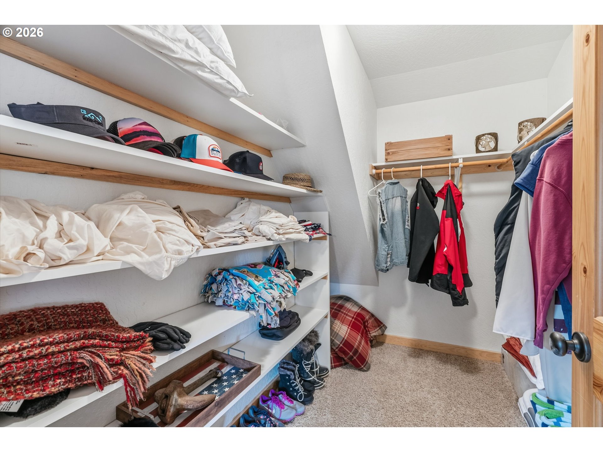 101 Lighthouse Lane Mossyrock, WA 98564 - Photo 15 of 37 a view of kids room with clothes shoes and a couch