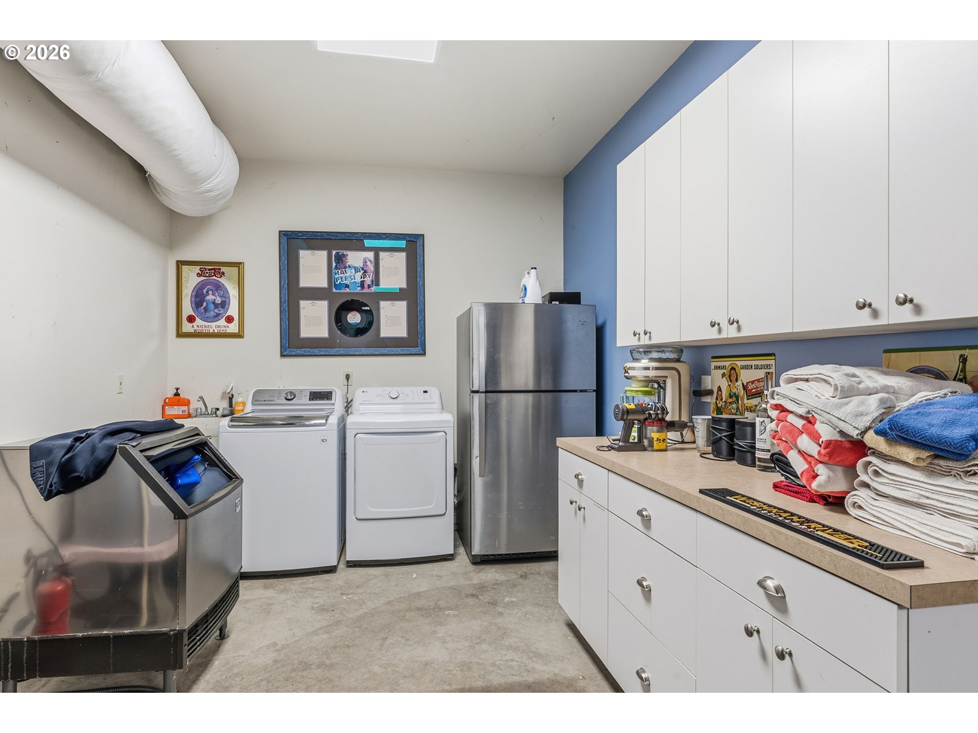 101 Lighthouse Lane Mossyrock, WA 98564 - Photo 29 of 37 a kitchen with refrigerator and cabinets