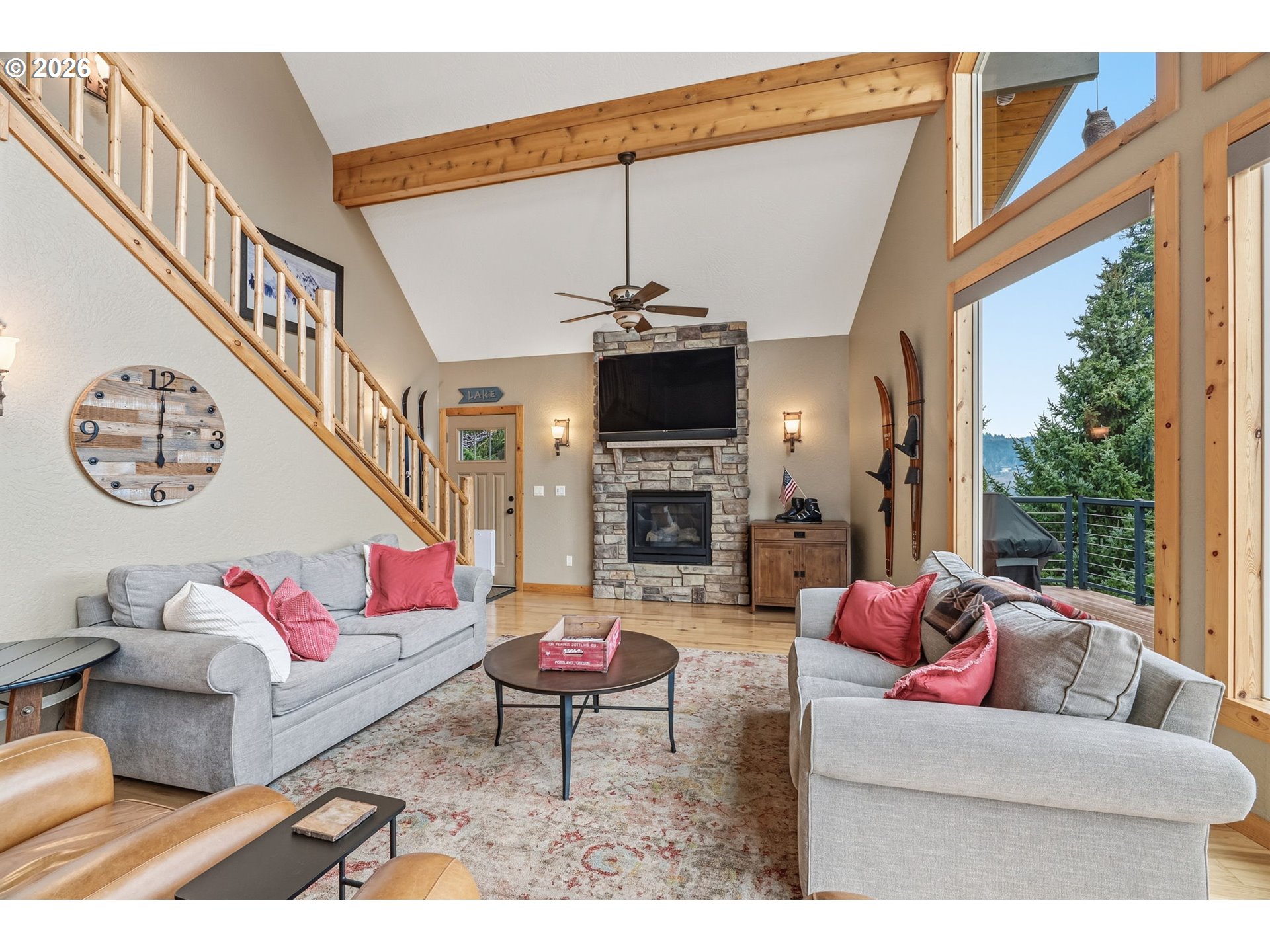 101 Lighthouse Lane Mossyrock, WA 98564 - Photo 6 of 37 a living room with furniture a fireplace and a large window