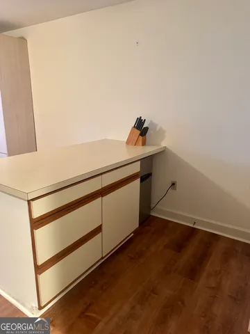 a view of storage and utility room with washer and dryer