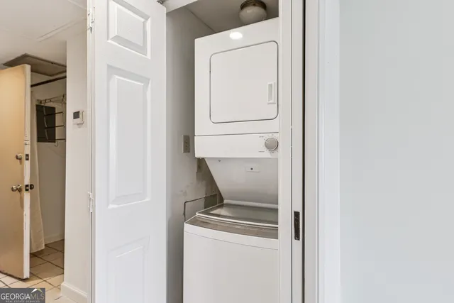 a stove top oven sitting inside of a kitchen