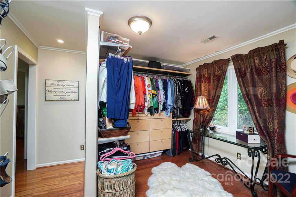8032 Windjammer Drive Tega Cay, SC 29708 - Photo 19 of 48 a view of a room with gym equipment