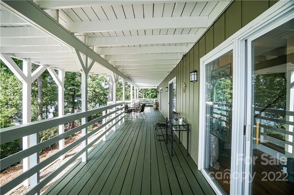 8032 Windjammer Drive Tega Cay, SC 29708 - Photo 24 of 48 a view of a balcony with chairs