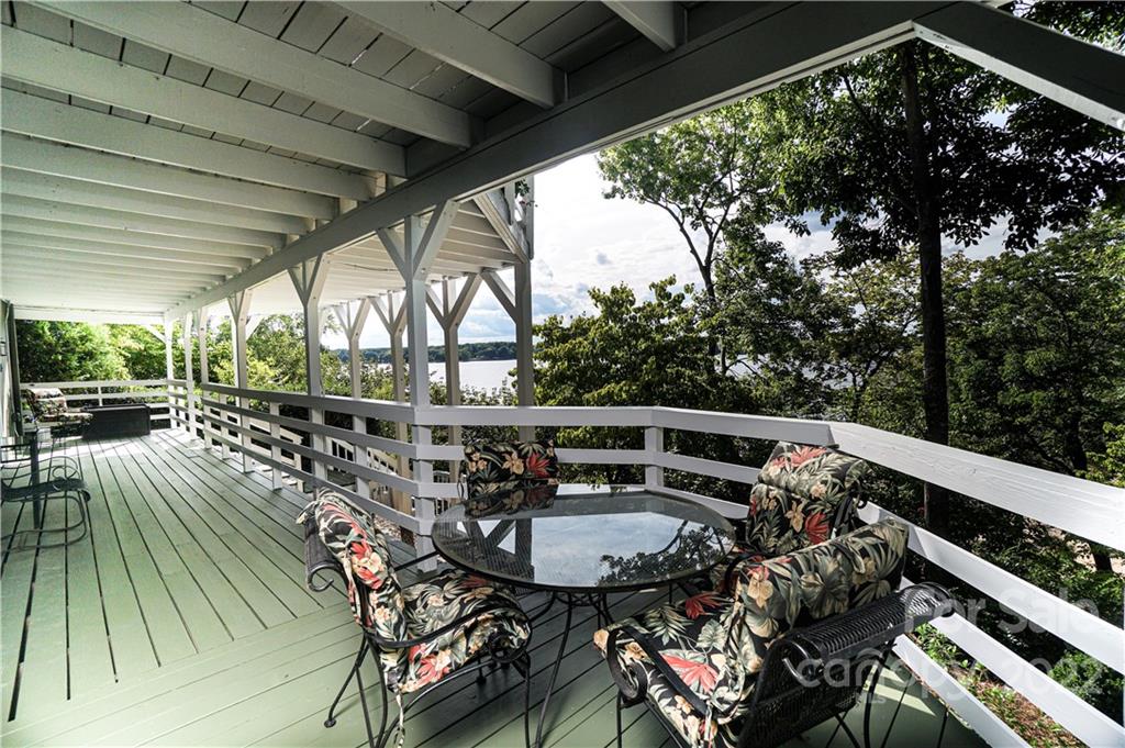 8032 Windjammer Drive Tega Cay, SC 29708 - Photo 26 of 48 a view of balcony with furniture and outdoor space