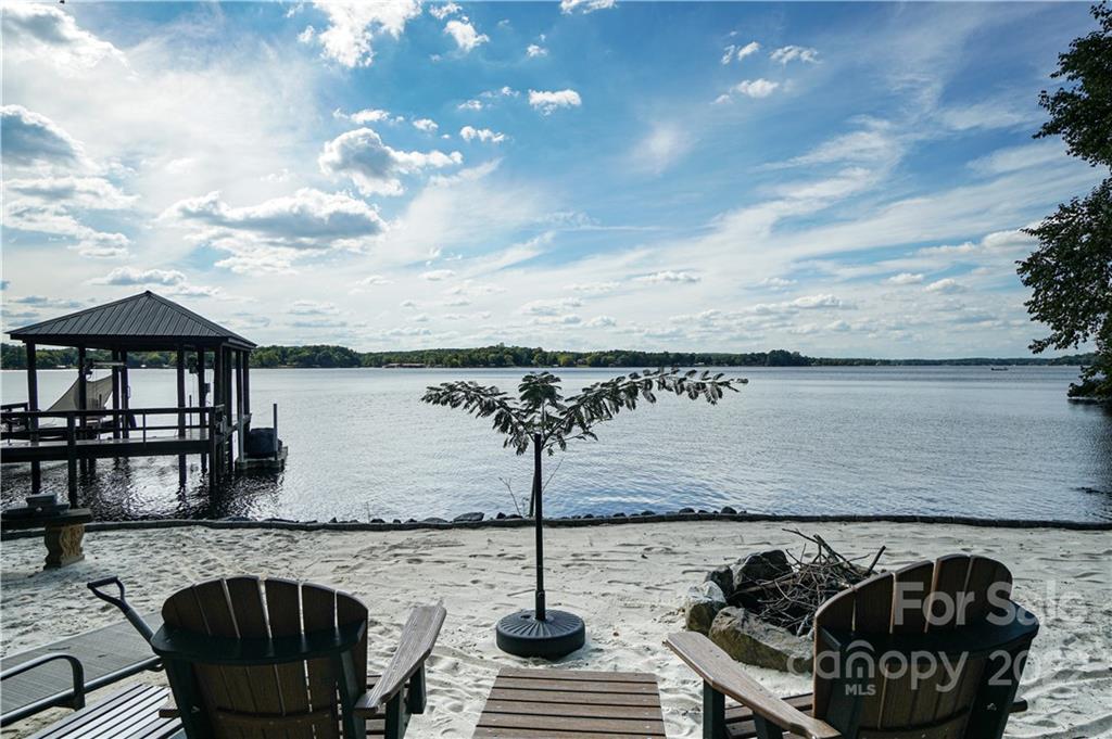 8032 Windjammer Drive Tega Cay, SC 29708 - Photo 40 of 48 a view of a terrace with chairs