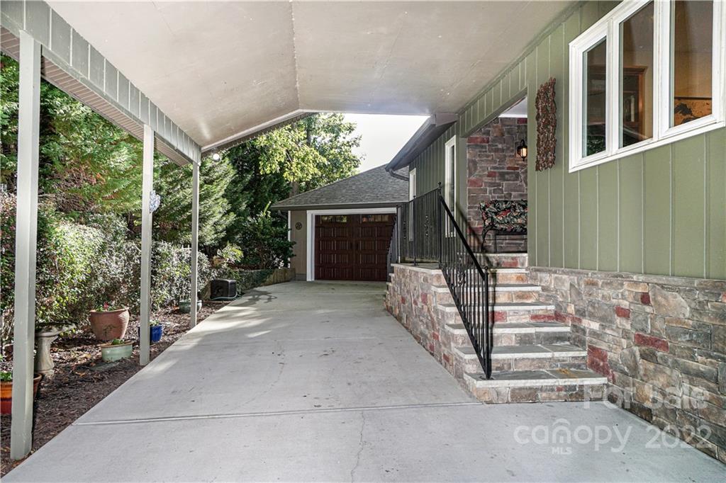 8032 Windjammer Drive Tega Cay, SC 29708 - Photo 46 of 48 a porch with seating space