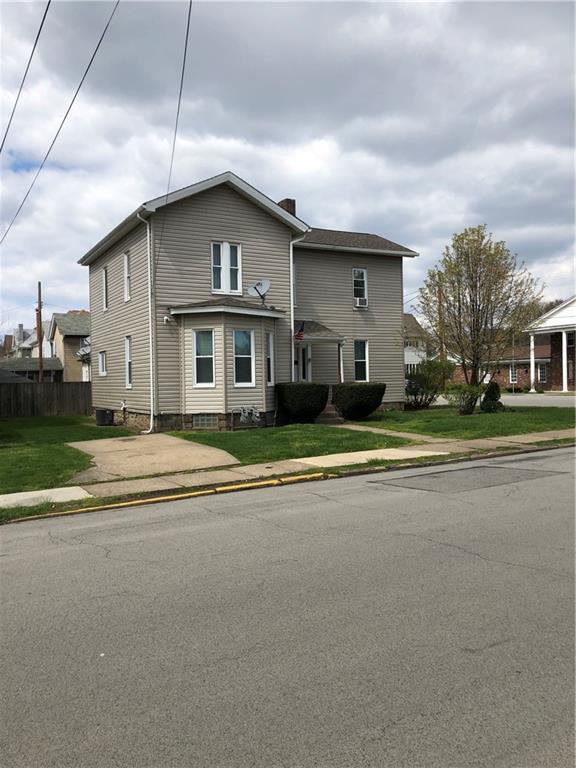 350 Jefferson Street Rochester, PA 15074 - Photo 1 of 19 a front view of a house with a yard