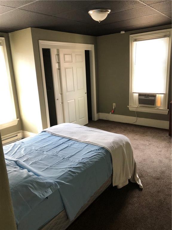 350 Jefferson Street Rochester, PA 15074 - Photo 14 of 19 a bedroom with a bed and a window