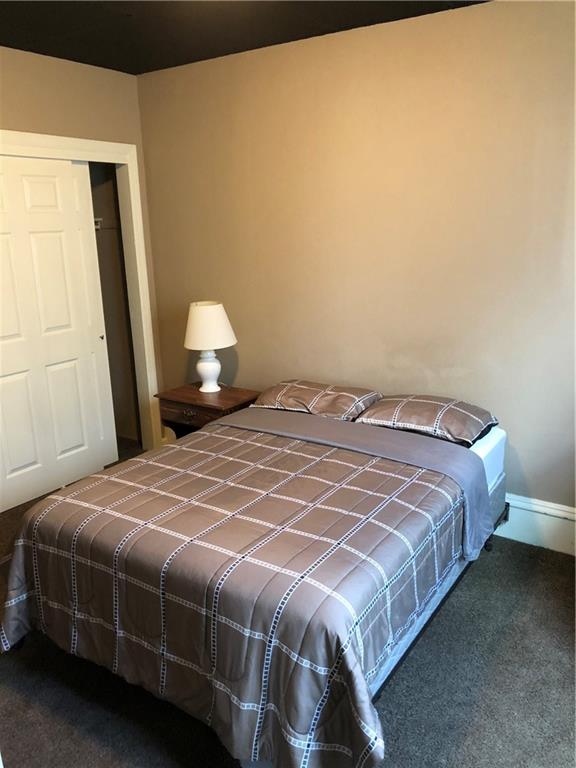 350 Jefferson Street Rochester, PA 15074 - Photo 8 of 19 a bedroom with a bed and a window
