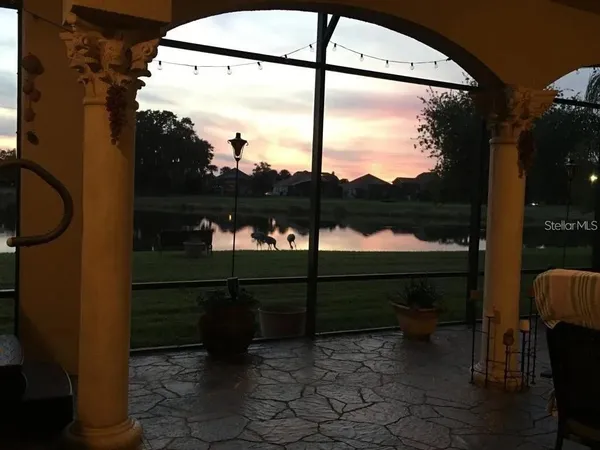 a view of a bench in front of a house