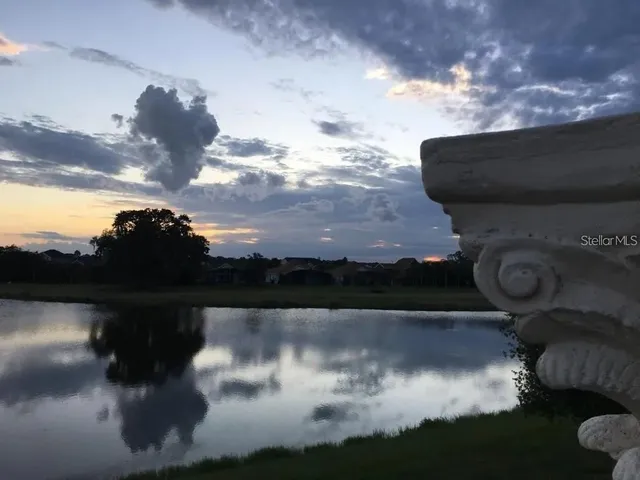 a view of a lake from a yard