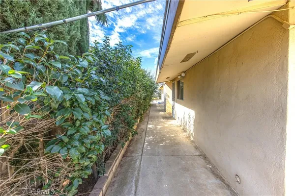 a view of a swimming pool and an outdoor space