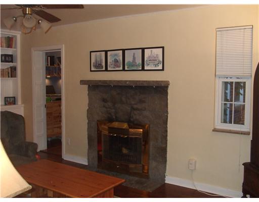 286 McCoy Road McKees Rocks, PA 15136 - Photo 3 of 18 Living Room. Stone Fireplace and Ceiling Fan