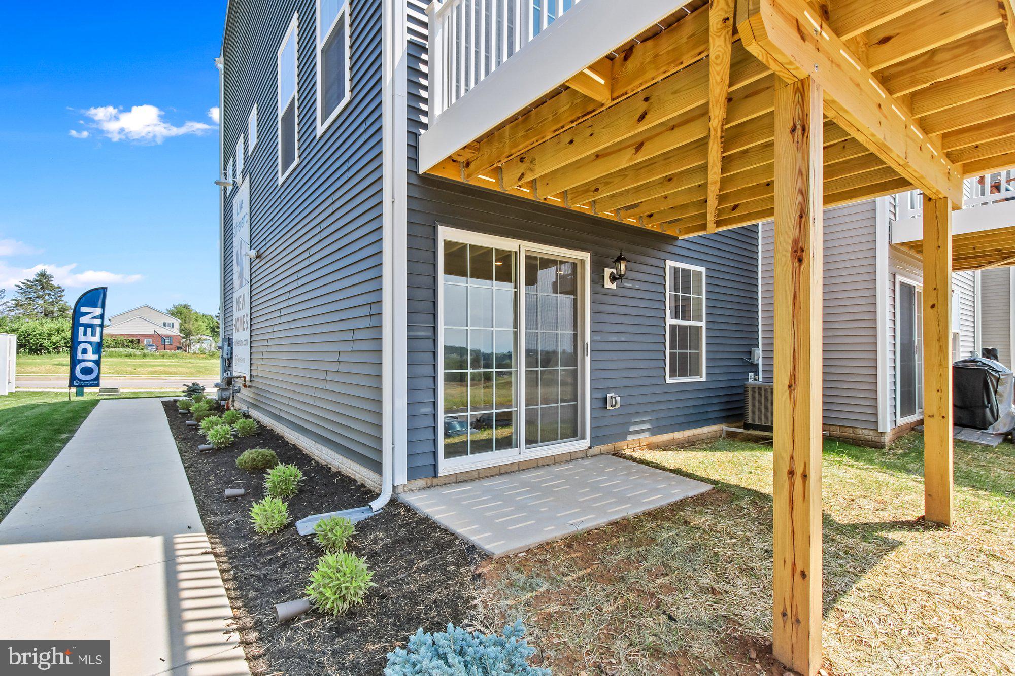 436 Bradford Drive, Unit 59 Red Lion, PA 17356 - Photo 41 of 43 a backyard of a house with seating space