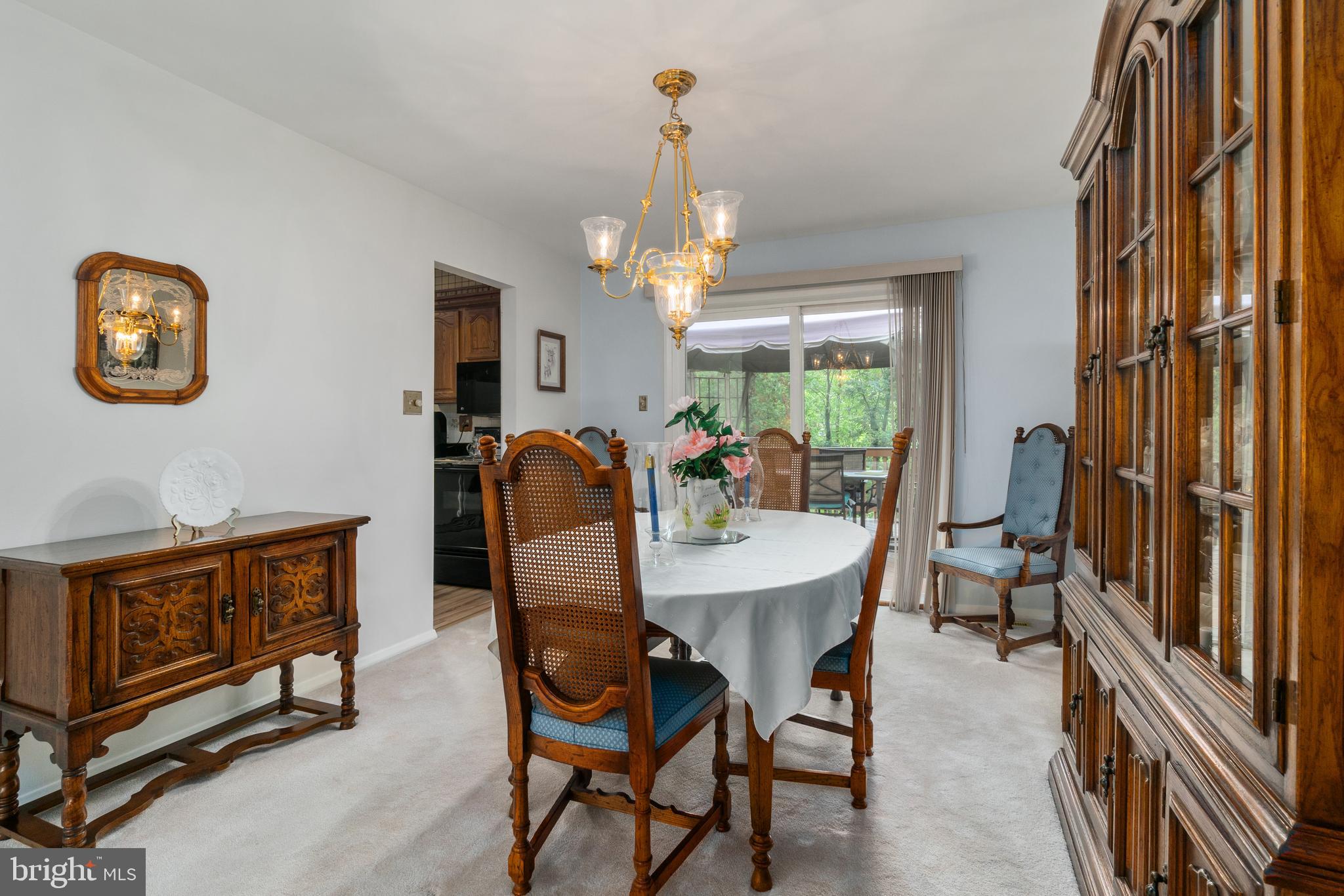 4232 Hermitage Drive Ellicott City, MD 21042 - Photo 23 of 42 Dining room's sliding doors lead to spacious deck