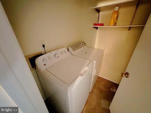 9285 Old Stagecoach Road La Plata, MD 20646 - Photo 9 of 14 a utility room with dryer and washer