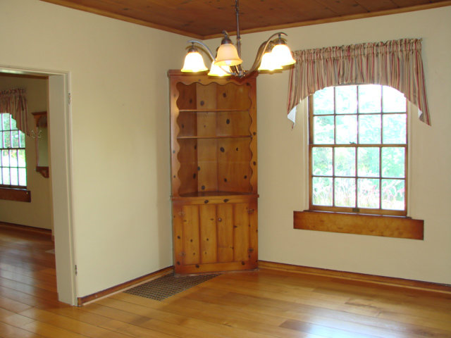 10790 Ridgeview Way San Jose, CA 95127 - Photo 4 of 25 an empty room with wooden floor fan and windows