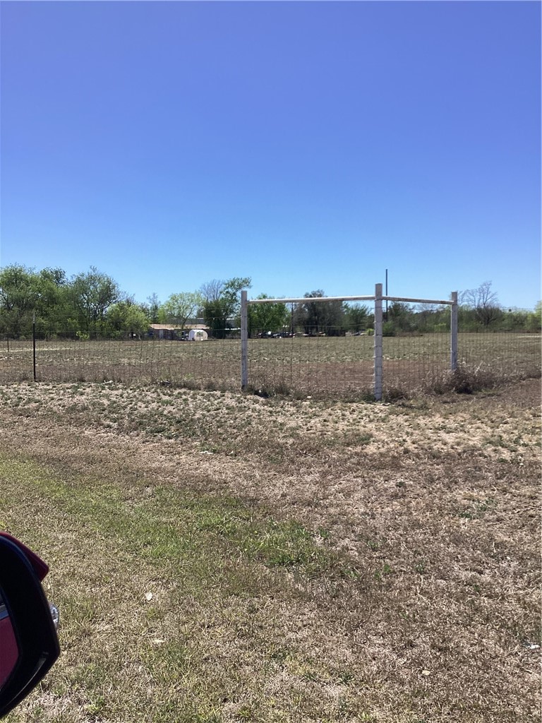 930 County Road 407 Freer, TX 78357 - Photo 3 of 4 a view of a yard with wooden fence