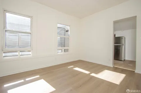 an empty room with windows