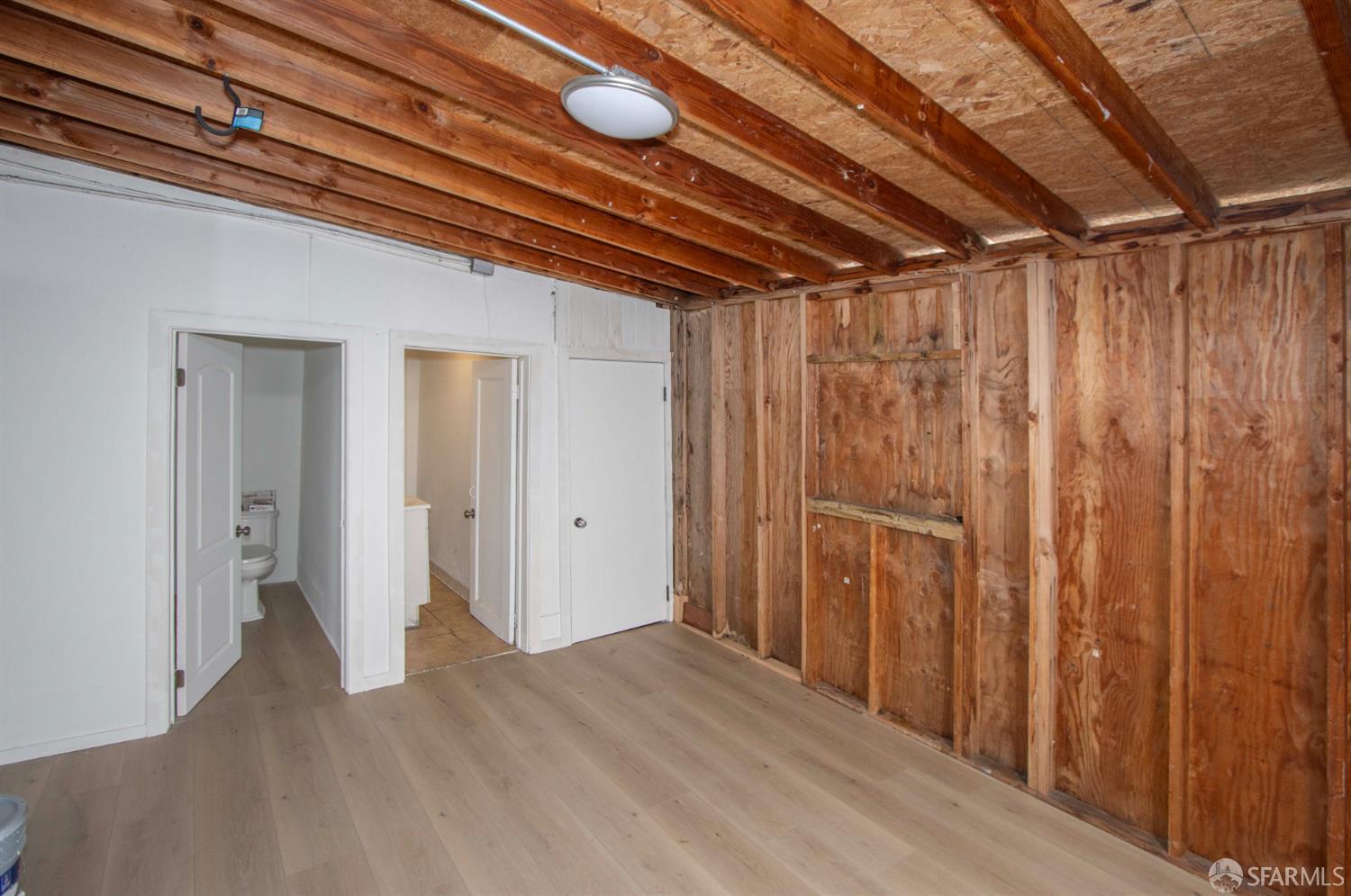 2976 Mission Street San Francisco, CA 94110 - Photo 15 of 21 a view of room with wooden walls
