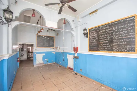 a view of washer and dryer with a kitchen