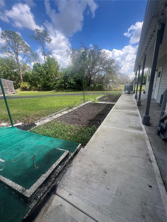 5855 Jack Brack Road St. Cloud, FL 34771 - Photo 62 of 86 a view of outdoor space and yard
