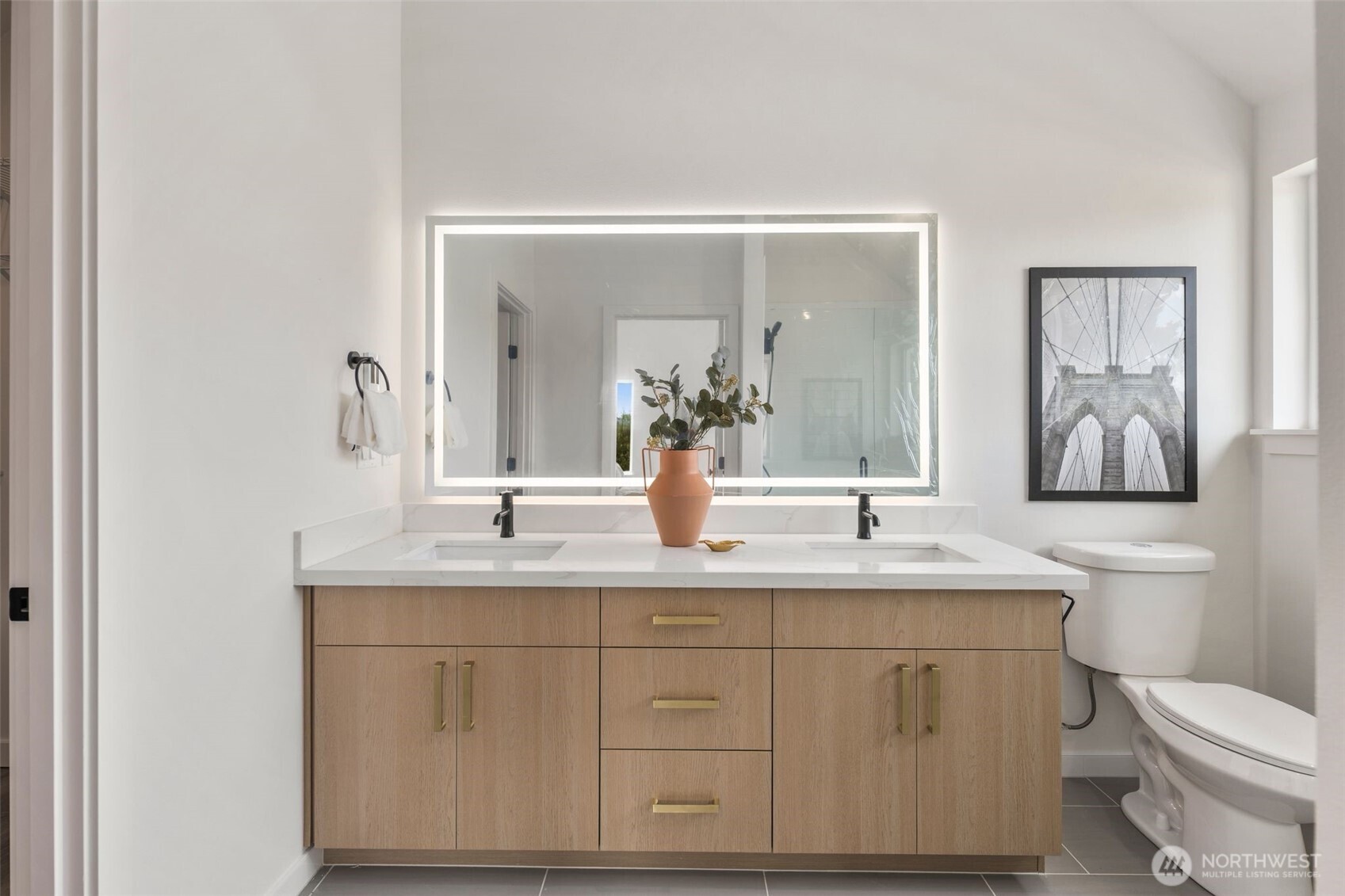 822 South Sullivan Street Seattle, WA 98108 - Photo 11 of 22 a bathroom with a granite countertop sink mirror and toilet