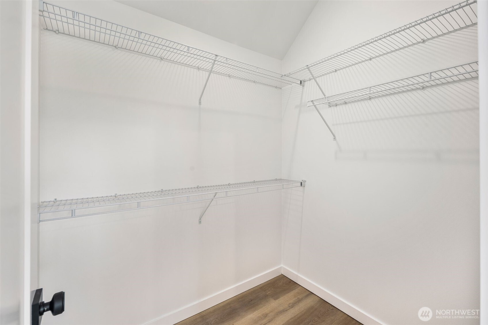 822 South Sullivan Street Seattle, WA 98108 - Photo 15 of 22 a view of a room with racks on the wall
