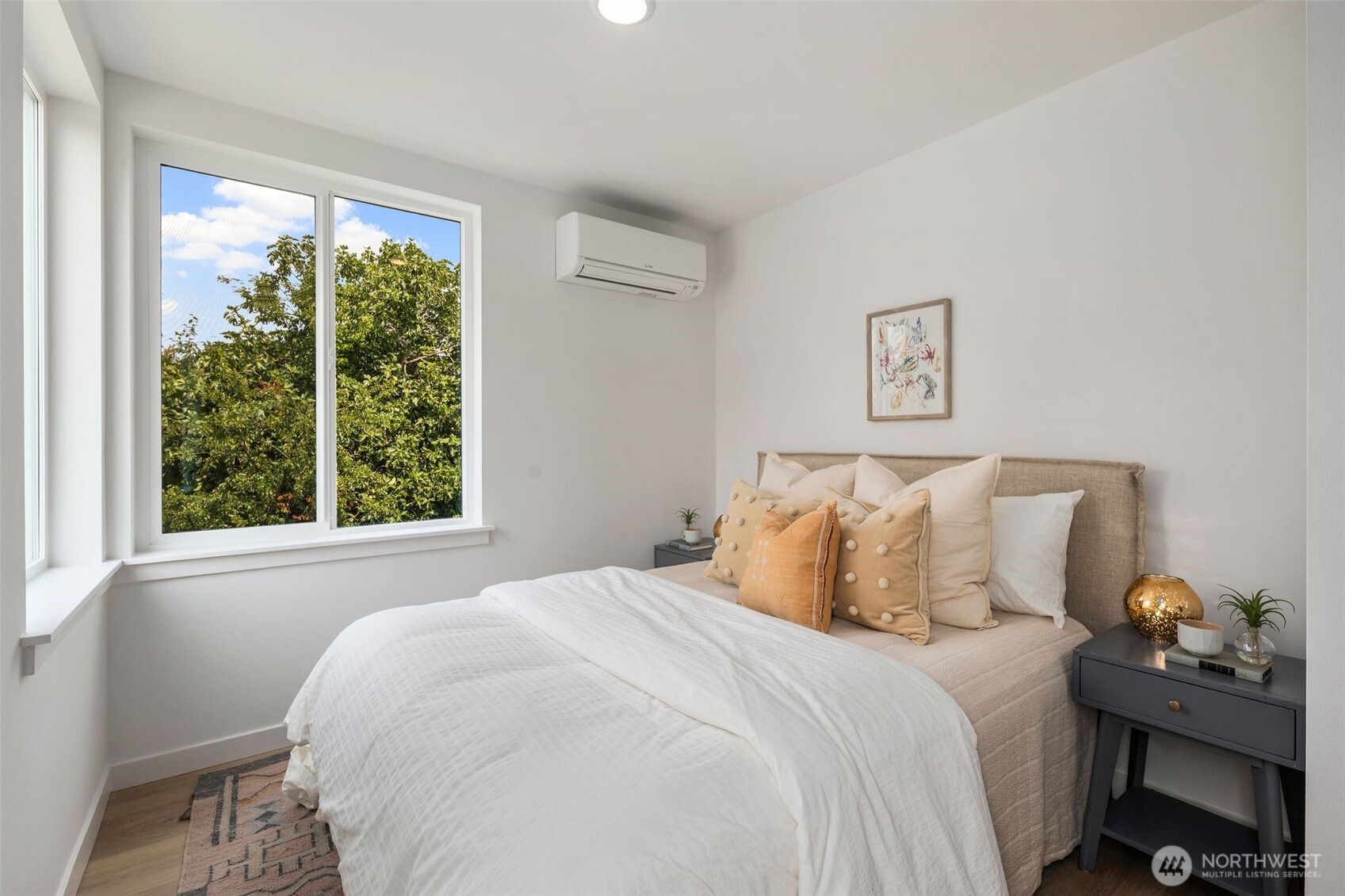 822 South Sullivan Street Seattle, WA 98108 - Photo 16 of 22 a bedroom with a bed and a window