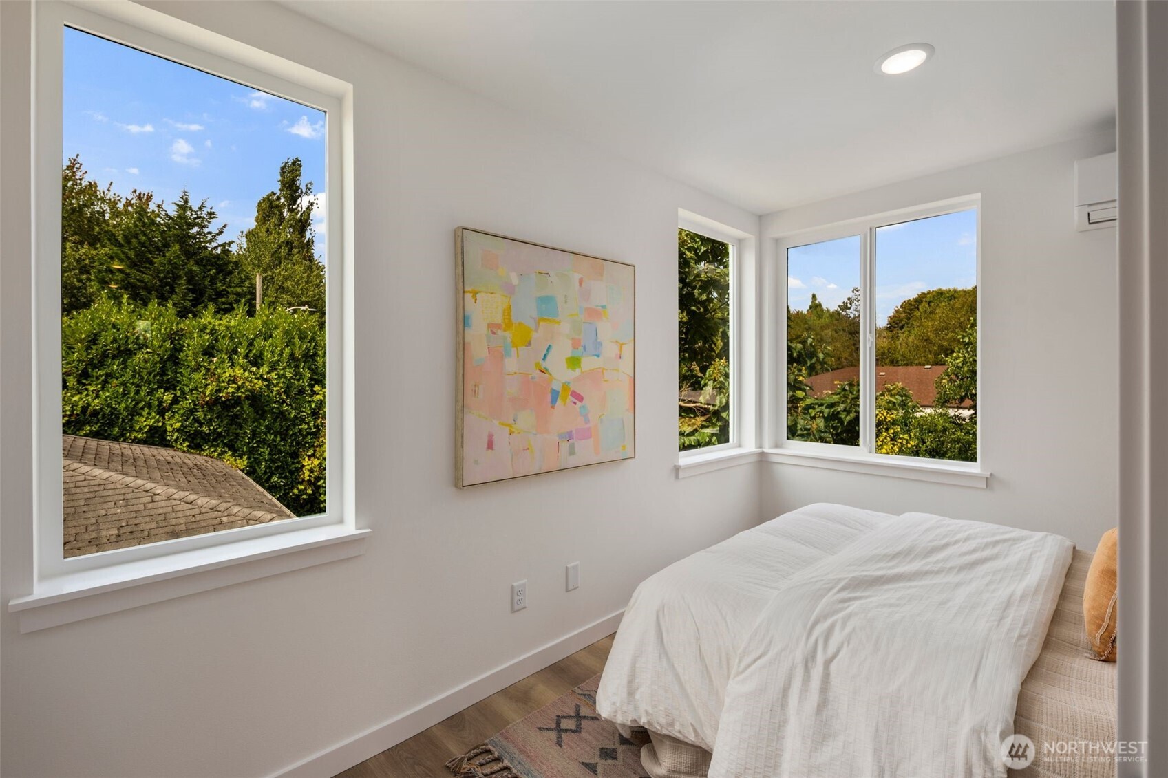 822 South Sullivan Street Seattle, WA 98108 - Photo 17 of 22 a bedroom with a bed and a painting on the wall