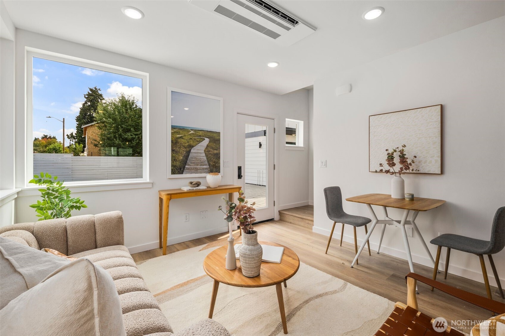 822 South Sullivan Street Seattle, WA 98108 - Photo 3 of 22 a living room with furniture and a potted plant