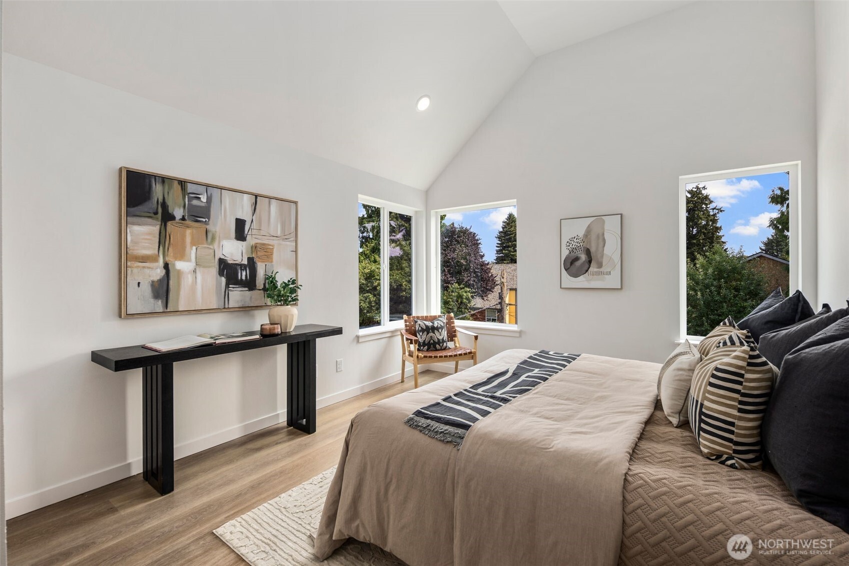 822 South Sullivan Street Seattle, WA 98108 - Photo 10 of 22 a bedroom with a bed and a table