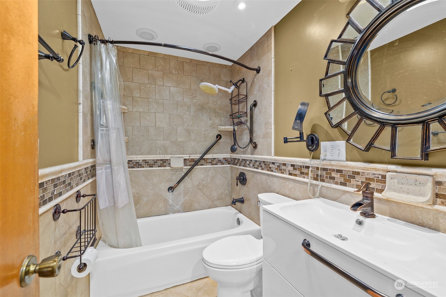 22929 38th Avenue Southeast Bothell, WA 98021 - Photo 12 of 38 a bathroom with a sink mirror toilet and shower