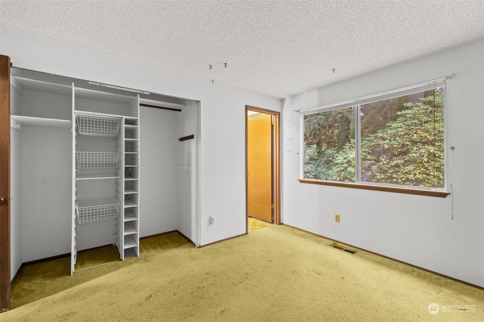 22929 38th Avenue Southeast Bothell, WA 98021 - Photo 13 of 38 an empty room with a window