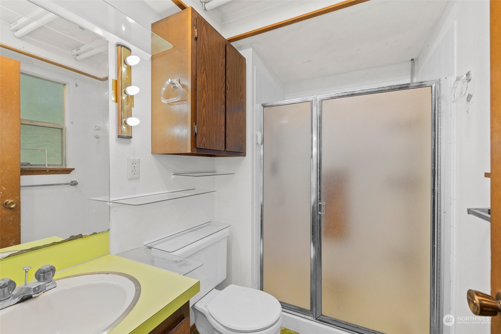 22929 38th Avenue Southeast Bothell, WA 98021 - Photo 16 of 38 a bathroom with a sink toilet and shower