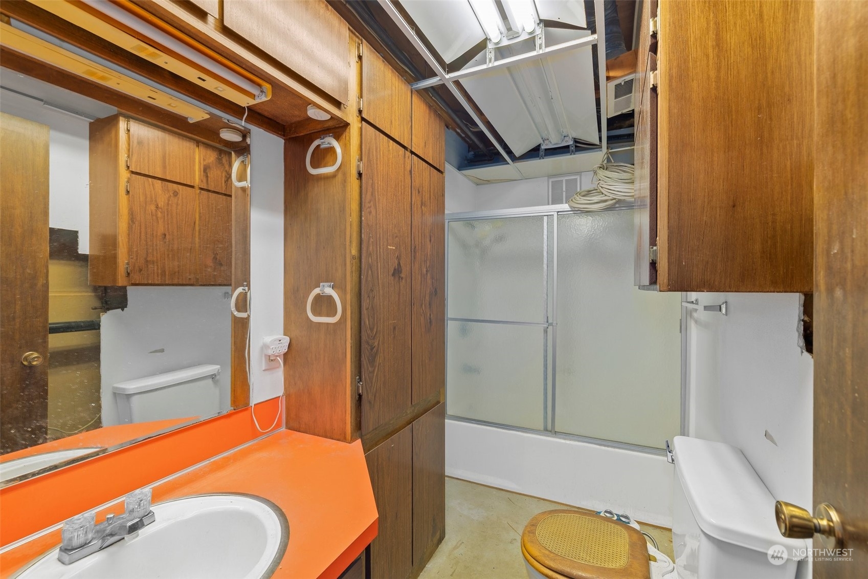 22929 38th Avenue Southeast Bothell, WA 98021 - Photo 26 of 38 a bathroom with a sink a toilet and shower