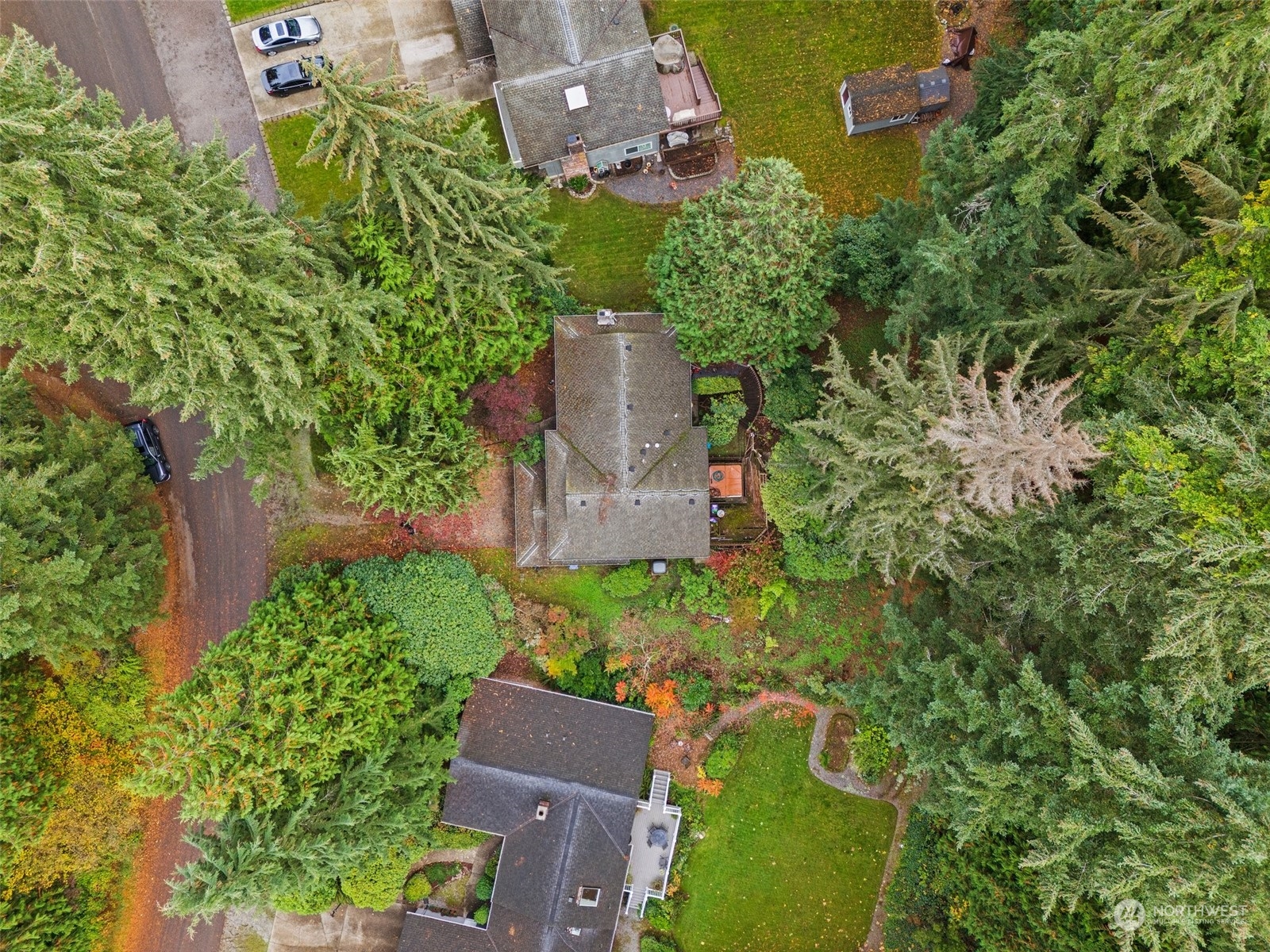22929 38th Avenue Southeast Bothell, WA 98021 - Photo 34 of 38 an aerial view of a house with a yard and lake view