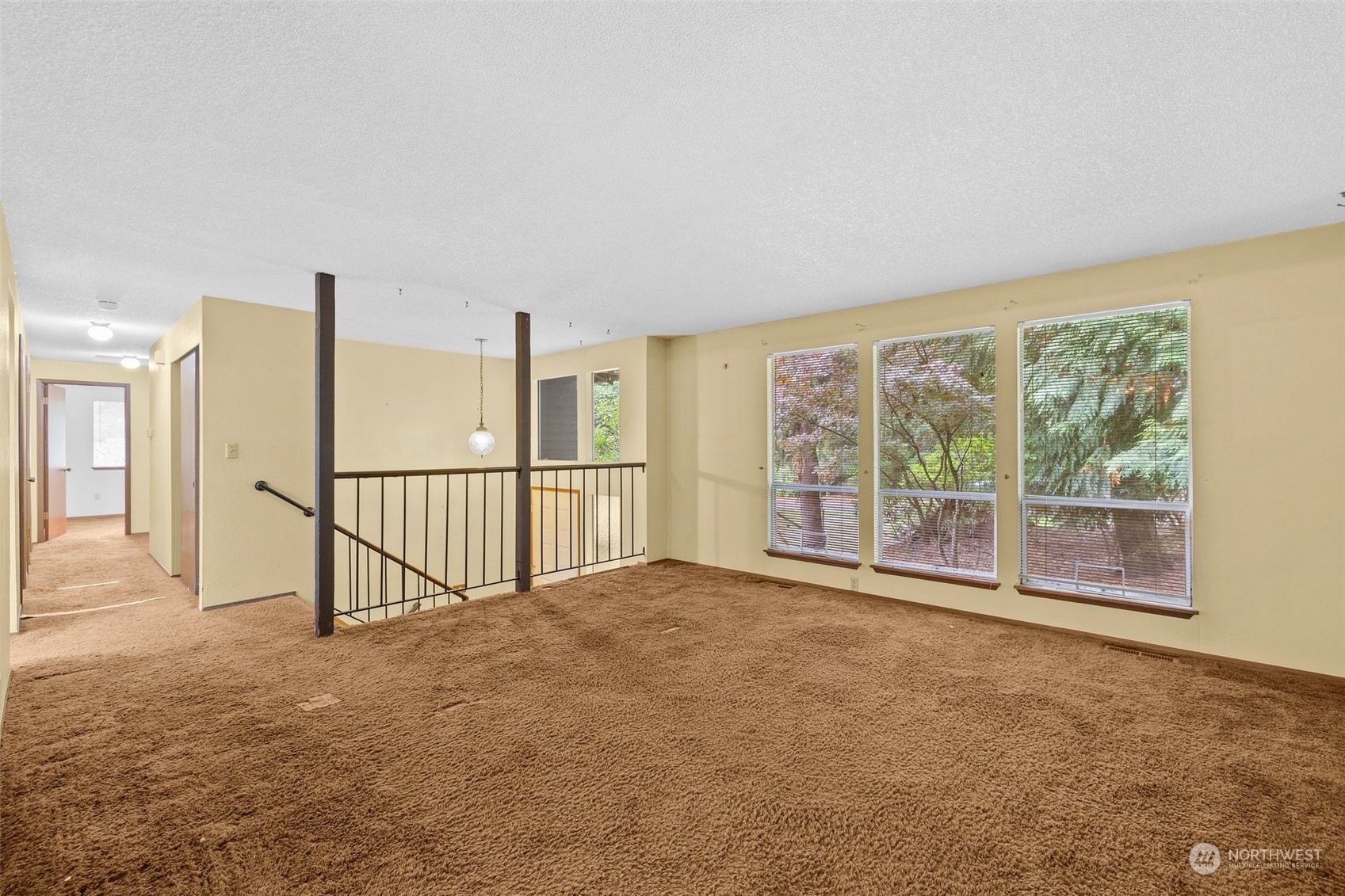 22929 38th Avenue Southeast Bothell, WA 98021 - Photo 5 of 38 a view of a big room with windows and stairs