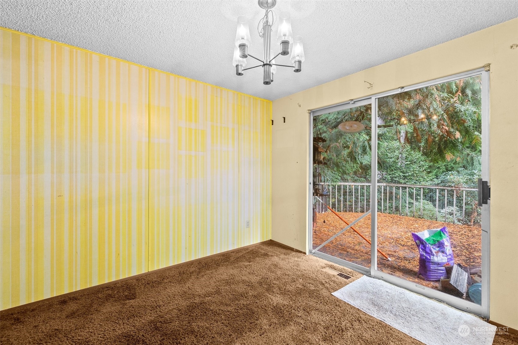 22929 38th Avenue Southeast Bothell, WA 98021 - Photo 7 of 38 a view of a bedroom with balcony and furniture