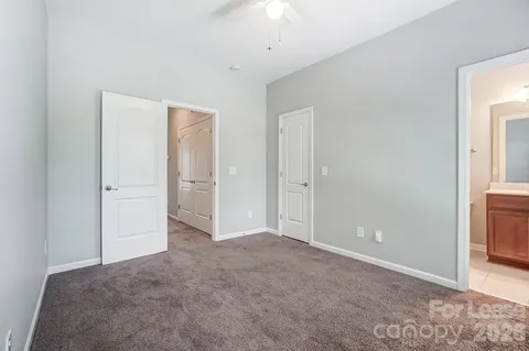 an empty room with closet area