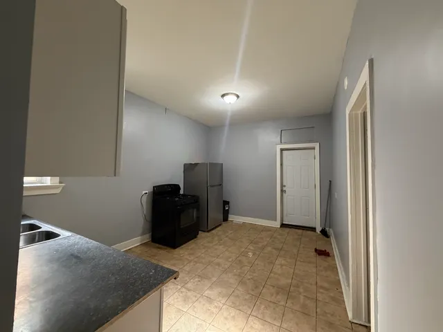 a view of a livingroom with furniture