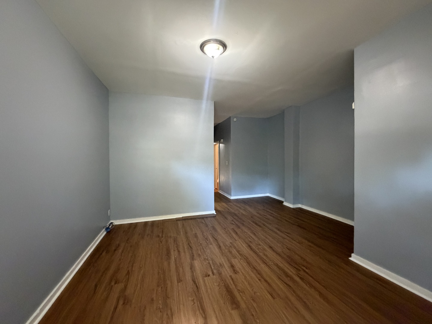6006 South Marshfield Avenue, Unit 1 Chicago, IL 60636 - Photo 4 of 14 a view of empty room with wooden floor