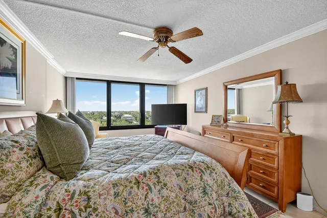 a bedroom with bed and window