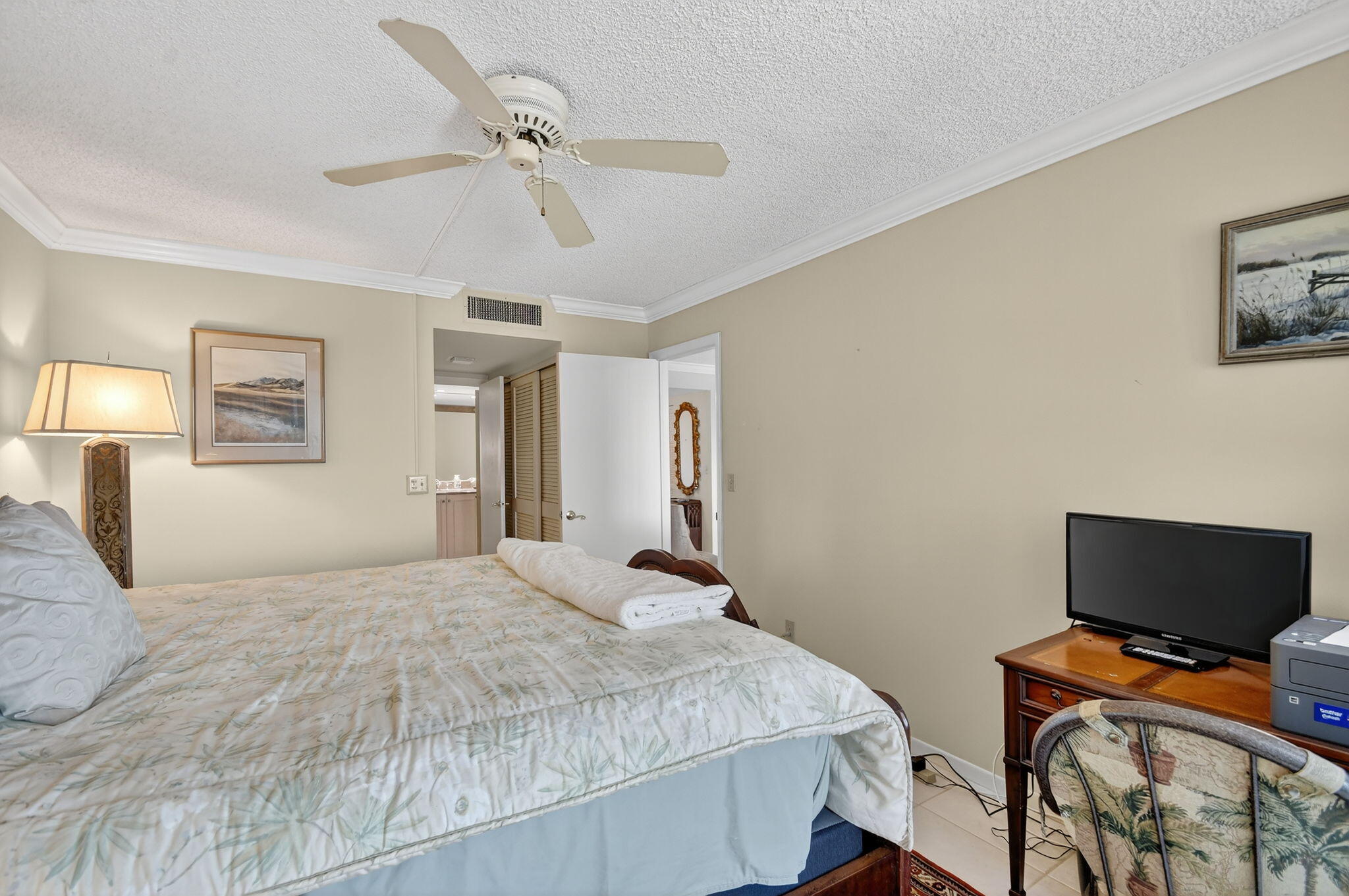 3589 South Ocean Boulevard, Unit 608 South Palm Beach, FL 33480 - Photo 26 of 66 a bedroom with bed and window