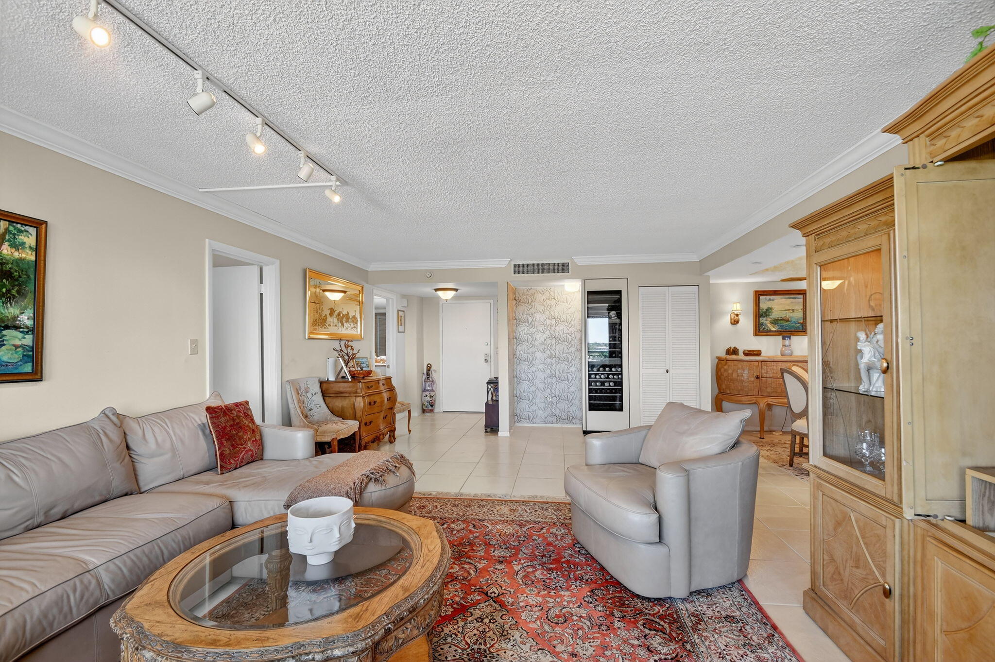 3589 South Ocean Boulevard, Unit 608 South Palm Beach, FL 33480 - Photo 8 of 66 a living room with fireplace furniture and a wooden floor