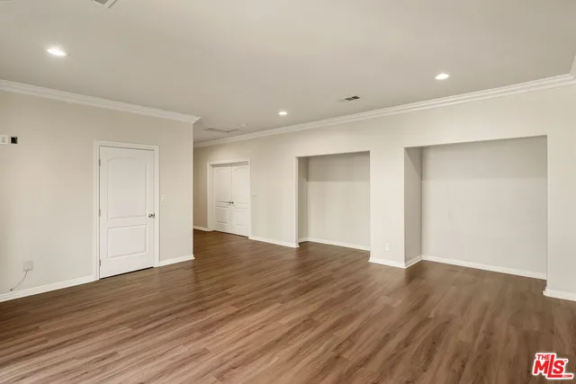 a bathroom with a toilet sink and shower